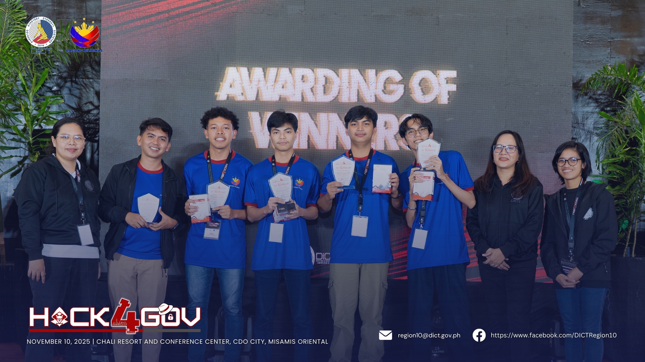 Hack4Gov competition awarding ceremony with team holding 1st runner up award